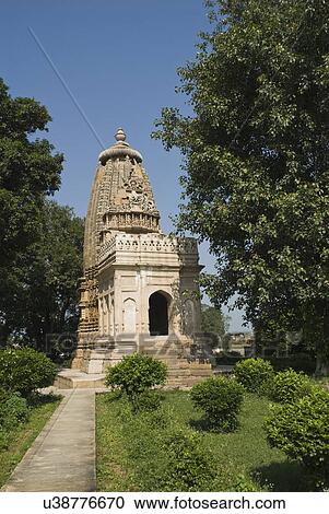 Garden in front of a temple, Kandariya Mahadeva Temple, Khajuraho, Chhatarpur District, Madhya Pradesh, India View Large Photo Image Stock Image - Garden in front of a temple, Kandariya Mahadeva Temple, Khajuraho, Chhatarpur District, Madhya Pradesh, India. Fotosearch