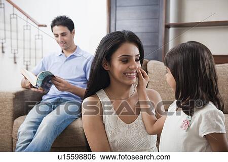 Girl playing with her mother View Large Photo Image Stock Photograph - Girl playing with her mother. Fotosearch