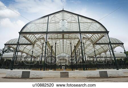 Stock Image - Glass house in a botanical garden, Lal Bagh Botanical Garden, Bangalore, Karnataka, India. Fotosearch