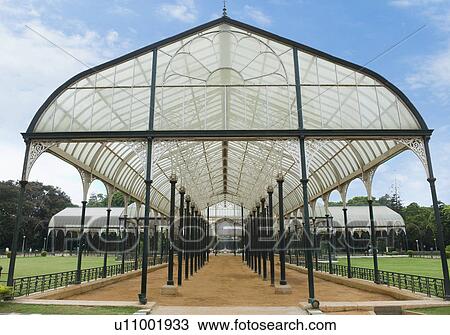 Stock Image - Glass house in a botanical garden, Lal Bagh Botanical Garden, Bangalore, Karnataka, India. Fotosearch