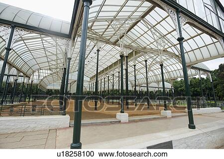 Stock Image - Glass house in a botanical garden, Lal Bagh Botanical Garden, Bangalore, Karnataka, India. Fotosearch