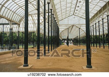 Stock Image - Glass house in a botanical garden, Lal Bagh Botanical Garden, Bangalore, Karnataka, India. Fotosearch