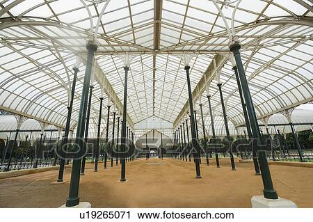 Stock Image - Glass house in a botanical garden, Lal Bagh Botanical Garden, Bangalore, Karnataka, India. Fotosearch