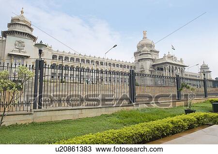 Stock Image - Government building viewed from a garden, Vidhana Soudha, Bangalore, Karnataka, India. Fotosearch