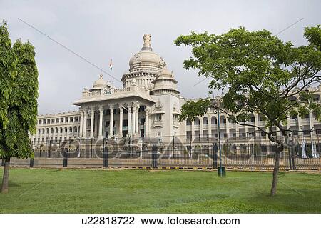 Stock Image - Government building viewed from a garden, Vidhana Soudha, Bangalore, Karnataka, India. Fotosearch