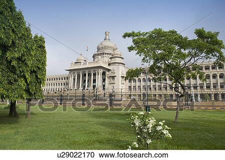 Stock Image - Government building viewed from a garden, Vidhana Soudha, Bangalore, Karnataka, India. Fotosearch