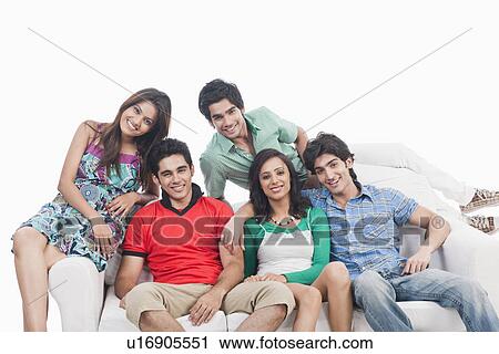 Group of friends on a couch View Large Photo Image Stock Image - Group of friends on a couch. Fotosearch