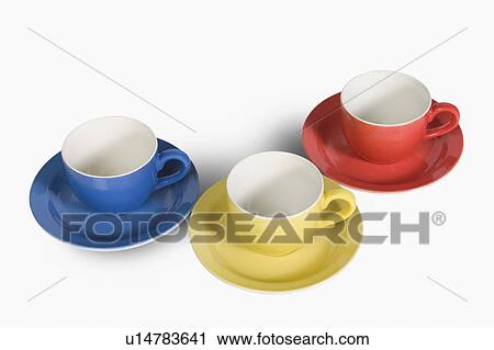 High angle view of colorful tea cups with saucers View Large Photo Image Stock Image - High angle view of colorful tea cups with saucers. Fotosearch