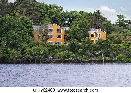 Houses at lakeside, Lakes of Killarney, County Kerry, Republic of Ireland View Large Photo Image Stock Image - Houses at lakeside, Lakes of Killarney, County Kerry, Republic of Ireland. Fotosearch