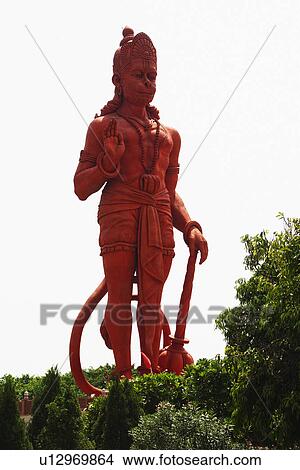 Idol of Lord Hanuman at a temple, Chhatarpur Temple, New Delhi, India View Large Photo Image Picture - Idol of Lord Hanuman at a temple, Chhatarpur Temple, New Delhi, India. Fotosearch
