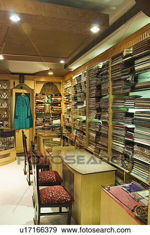 Stock Photo - Interiors of a clothing store, New Delhi, India. Fotosearch