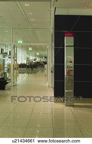 Stock Image - Interiors of an airport lounge, Paris, France. Fotosearch