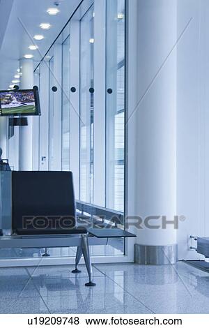 Stock Photo - Interiors of an airport lounge, Paris, France. Fotosearch