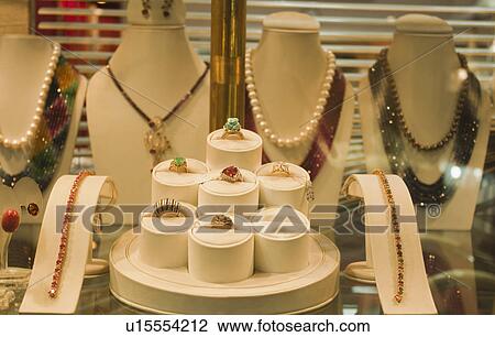 Stock Image - Jewelry on display in a jewelry store, New Delhi, India. Fotosearch