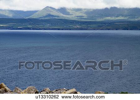Lake with mountains in the background, Lakes of Killarney, County Kerry, Republic of Ireland View Large Photo Image Stock Image - Lake with mountains in the background, Lakes of Killarney, County Kerry, Republic of Ireland. Fotosearch