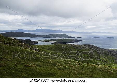 Stock Photo - Lake with mountains in the background, Lakes of Killarney, Ring Of Kerry, County Kerry, Republic of Ireland. Fotosearch