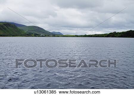 Lake with mountains in the background, Lakes of Killarney, County Kerry, Republic of Ireland View Large Photo Image Stock Photography - Lake with mountains in the background, Lakes of Killarney, County Kerry, Republic of Ireland. Fotosearch