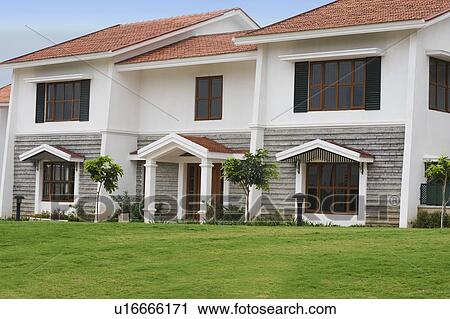 Stock Image - Lawn in front of a bungalow, Bangalore, Karnataka, India. Fotosearch