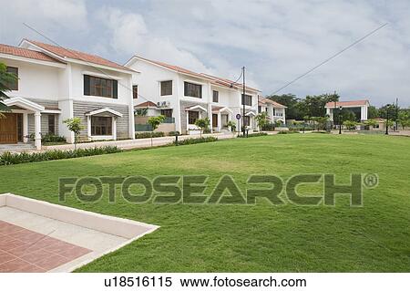 Stock Photography - Lawn in front of bungalows, Bangalore, Karnataka, India. Fotosearch