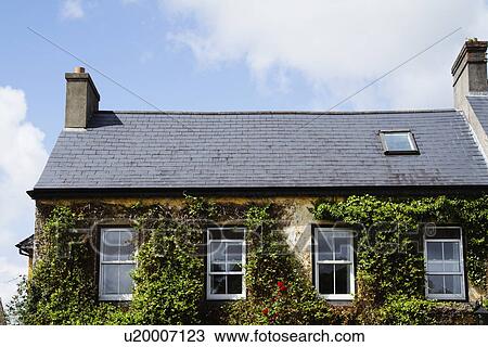 Stock Image - Low angle view of a cafe, The Good Room Cafe, Adare, County Limerick, Republic of Ireland. Fotosearch