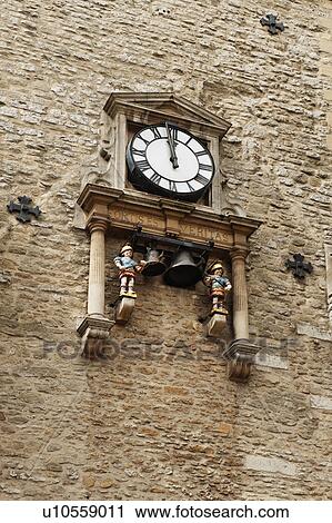 Stock Image - Low angle view of a clock tower, Carfax Tower, Oxford, Oxfordshire, England. Fotosearch