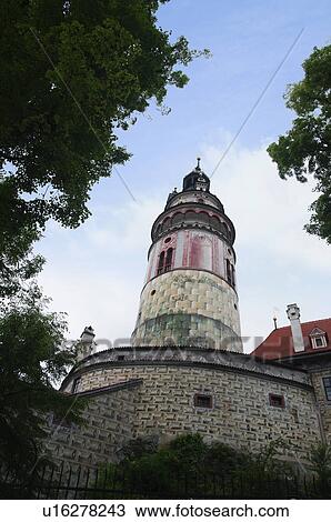 Stock Image - Low angle view of a clock tower in a castle, Cesky Krumlov Castle, Cesky Krumlov, South Bohemian Region, Czech Republic. Fotosearch