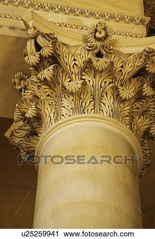 Stock Image - Low angle view of a column in a museum, Musee du Louvre, Paris, France. Fotosearch