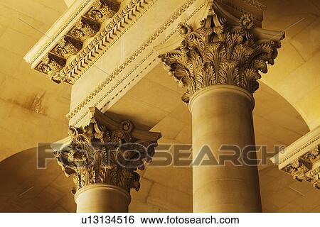 Stock Photograph - Low angle view of a column in a museum, Musee du Louvre, Paris, France. Fotosearch