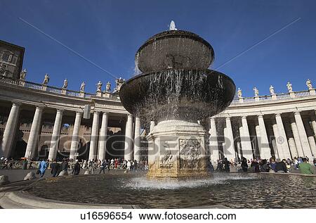 Picture - Low angle view of a fountain at St. Peters Square, Vatican City. Fotosearch