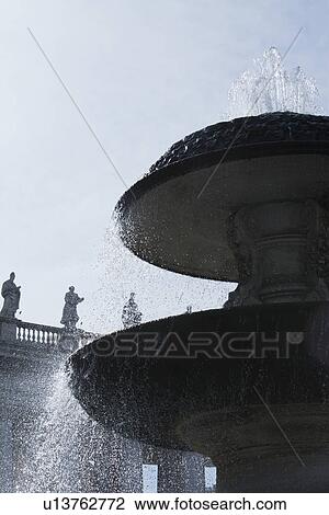 Low angle view of a fountain at St. Peters Square, Vatican City View Large Photo Image Stock Image - Low angle view of a fountain at St. Peters Square, Vatican City. Fotosearch