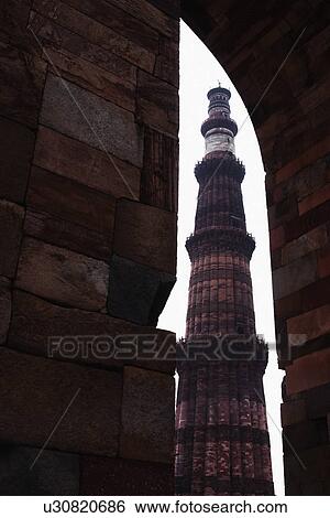 Low angle view of a minaret, Qutub Minar, Delhi, India View Large Photo Image Stock Photograph - Low angle view of a minaret, Qutub Minar, Delhi, India. Fotosearch