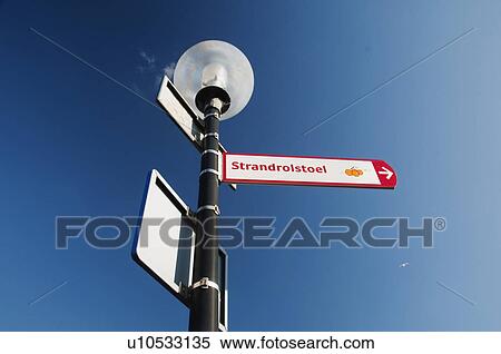 Low angle view of a signboard, The Hague, Netherlands View Large Photo Image Stock Photography - Low angle view of a signboard, The Hague, Netherlands. Fotosearch