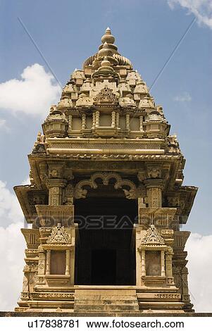 Low angle view of a temple, Lakshmana Temple, Khajuraho, Chhatarpur District, Madhya Pradesh, India View Large Photo Image Stock Image - Low angle view of a temple, Lakshmana Temple, Khajuraho, Chhatarpur District, Madhya Pradesh, India. Fotosearch
