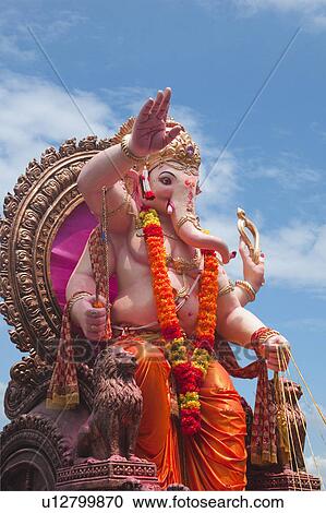 Low angle view of idol of Lord Ganesha, Mumbai, Maharashtra, India View Large Photo Image Stock Image - Low angle view of idol of Lord Ganesha, Mumbai, Maharashtra, India. Fotosearch