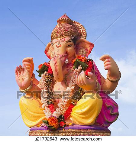 Low angle view of idol of Lord Ganesha, Mumbai, Maharashtra, India View Large Photo Image Stock Image - Low angle view of idol of Lord Ganesha, Mumbai, Maharashtra, India. Fotosearch