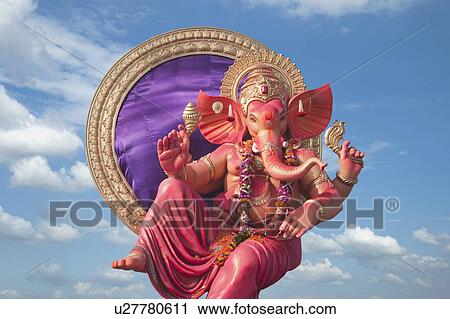 Stock Image - Low angle view of idol of Lord Ganesha, Mumbai, Maharashtra, India. Fotosearch