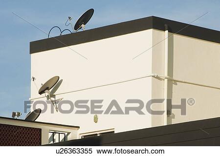 Low angle view of satellite dishes on a house, Tirupati, Andhra Pradesh, India View Large Photo Image Stock Photography - Low angle view of satellite dishes on a house, Tirupati, Andhra Pradesh, India. Fotosearch