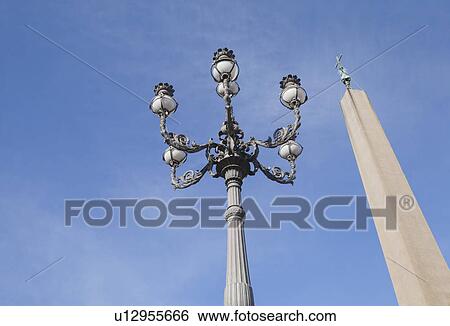 Low angle view of Vatican Obelisk and a street light, Vatican City View Large Photo Image Stock Photograph - Low angle view of Vatican Obelisk and a street light, Vatican City. Fotosearch