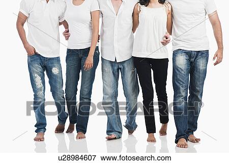 Low section view of friends walking together View Large Photo Image Stock Photo - Low section view of friends walking together. Fotosearch