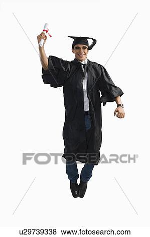 Male graduate cheering with his diploma View Large Photo Image Stock Photo - Male graduate cheering with his diploma. Fotosearch