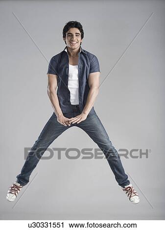 Man jumping View Large Photo Image Stock Image - Man jumping. Fotosearch