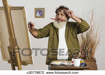 Man painting View Large Photo Image Stock Image - Man painting. Fotosearch