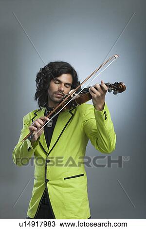Stock Image - Man playing a violin. Fotosearch