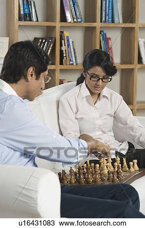 Man playing chess with his daughter View Large Photo Image Stock Image - Man playing chess with his daughter. Fotosearch