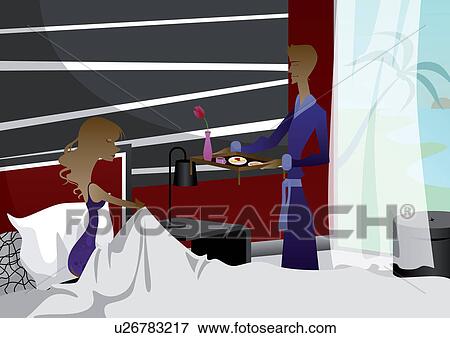 Stock Photo - Man serving tea to his wife on the bed. Fotosearch