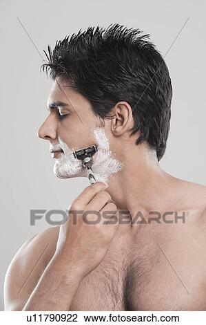 Stock Image - Man shaving. Fotosearch