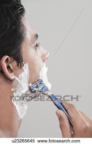 Stock Photography - Man shaving. Fotosearch