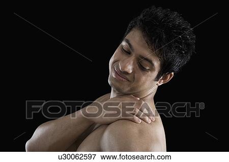 Stock Photo - Man suffering from backache. Fotosearch