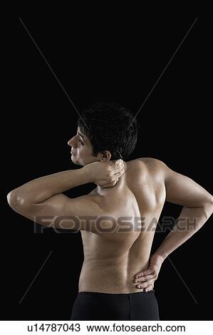 Man suffering from neckache View Large Photo Image Stock Image - Man suffering from neckache. Fotosearch