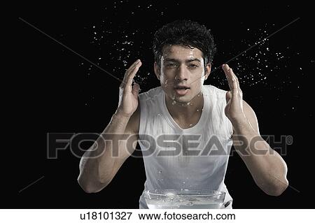 Stock Photo - Man washing face. Fotosearch